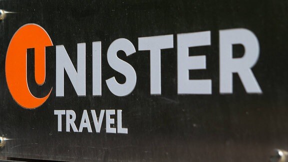 Schild von Unister Travel