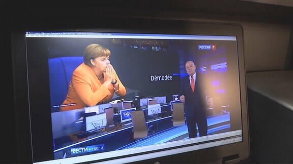 Angela Merkel in einer russischen Nachrichtensendung