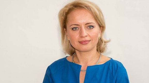Anna Skryleva, eine Frau mit schulterlangen Haaren