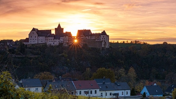 Burg Mildenstein bei Sonnenuntergang.