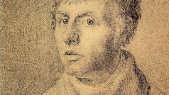 Eine Bleistiftzeichnung eines jungen Mannes der den Kopf nach links dreht.