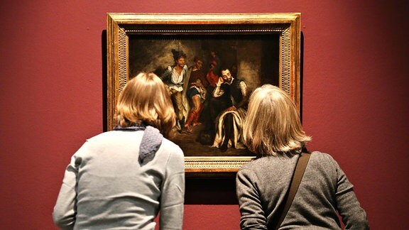 Zwei Frauen betrachten das Bild Tasso im Irrenhaus von Eugene Delacroix