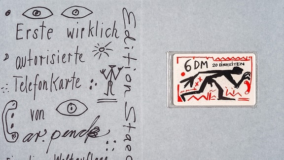 Auf eine silber glänzenden Karte steht "erste autorisierte Telefonkarte von a.r.penck"