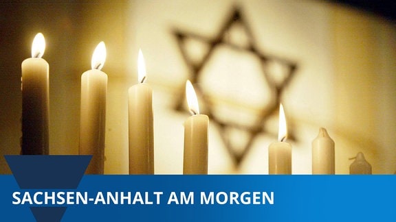 Chanukka-Leuchter mit 5 brennenden Kerzen anlässlich des Chanukka-Festes der Jüdischen Gemeinde Thüringen in Erfurt.
