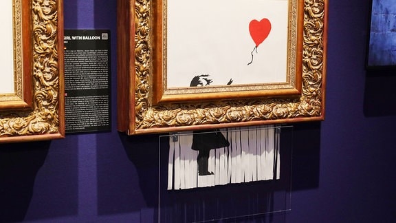 Ein halbgeschredderstes Bild von dem Künstler Banksy