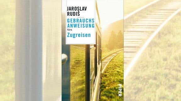  Blick aus dem Zugfenster auf dem Cover von "Gebrauchsanweisung fürs Zugfahren" von Autor Jaroslav Rudiš.