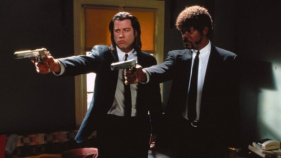 Samuel L. Jackson und John Travolta mit Pistolen, im Film «Pulp Fiction»