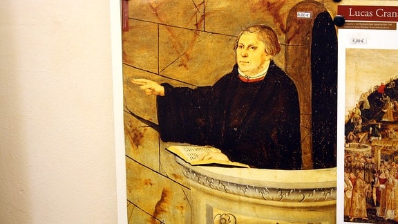 Predigender Martin Luther auf einem Plakat in der Stadtkirche Wittenberg