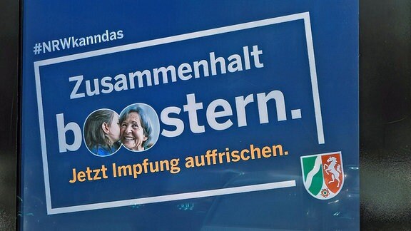Hinweis mit der Aufforderung zum boostern