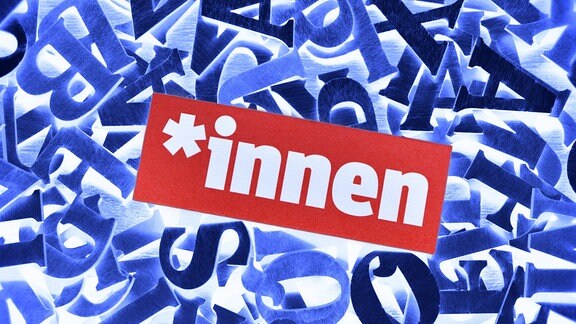 Illustration - Gendersternchen und Schriftzug *innen auf Buchstaben