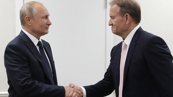 Prorussischer ukrainischer Oligarch Viktor Medwedtschuk mit Russlands Präsidenten Wladimir Putin