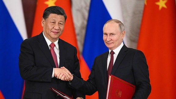 Xi Jinping und Wladimir Putin im Kreml