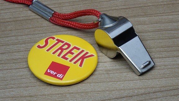 Trillerpfeife und Verdi-Button