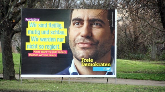 Ein Wahlplakat der FDP zeigt deren Spitzenkandidaten Frank Sitta