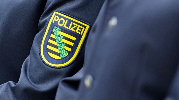 Wappen der sächsischen Polizei an Uniformen
