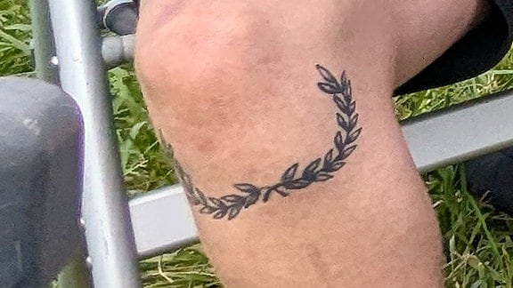 Ein Lorbeerkranz-Tattoo