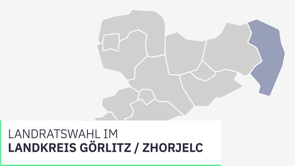 Wahl Landkreis Görlitz / Zhorjelc. Ein Kreuz wird mit einem Stift auf einem Zettel gesetzt.