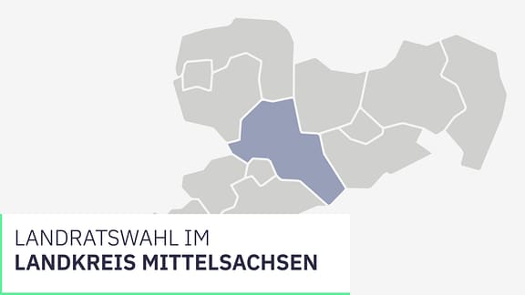 Wahl Landkreis Mittelsachsen. Ein Kreuz wird mit einem Stift auf einem Zettel gesetzt.