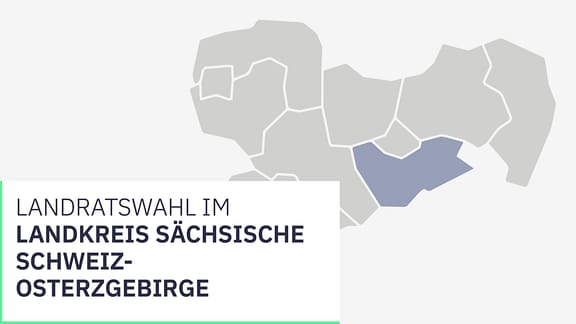 Wahl Landkreis Sächsische Schweiz-Osterzgebirge. Ein Kreuz wird mit einem Stift auf einem Zettel gesetzt.