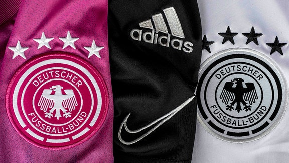 Logos des DFB, adidas und Nike nebeneinander auf Textilien