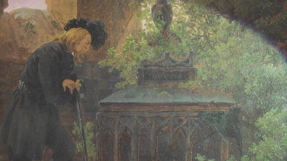 Ein Gemälde von Caspar David Friedrich zeigt einen auf einen Stock gestützten Mann.