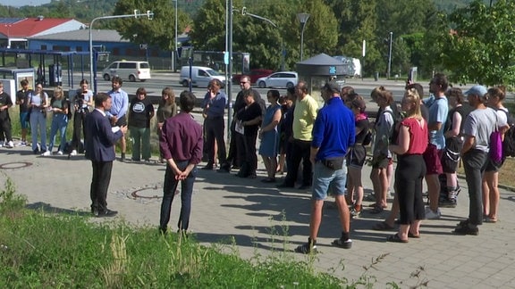 Menschen gedenken NSU-Opfer in Jena