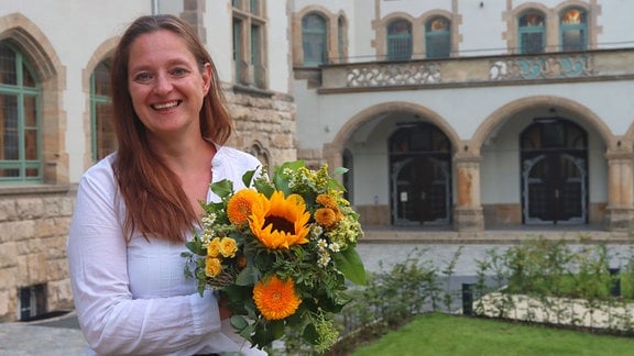 Kathleen Lützkendorf tritt bei der Kommunalwahl 2024 als Kandidatin der Grünen um das Amt des Oberbürgermeisters von Jena an.
