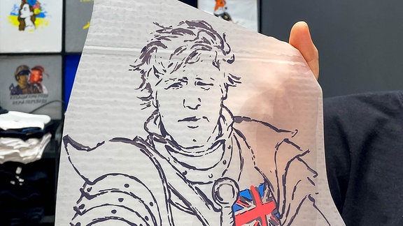 Boris-Johnson-Porträt, das auf T-Shirts gedruckt wird - in der Ukraine ein Verkaufsschlager