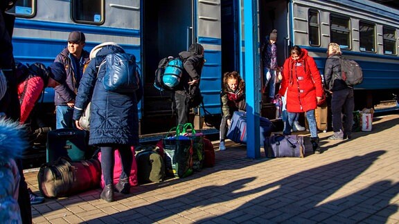 March 19, 2022, Przemysl, Poland: People are seen boarding a train to Lviv. Ukrainians return to Ukraine from Poland by train. Some were returning after being unable to find resource in Poland others where going back to help their families. Przemysl Poland