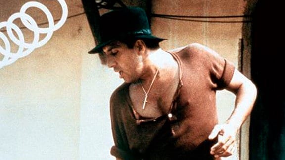 Beim Weintraubenpressen nimmt Elia (Adriano Celentano) den Kampf Mensch gegen Maschine auf.
