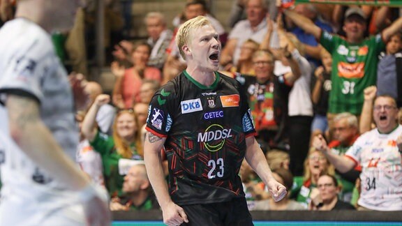 Magnus Saugstrup vom SC Magdeburg, 23 jubelt.