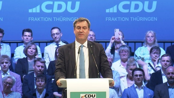 Markus Söder hinter einem CDU-Rednerpult