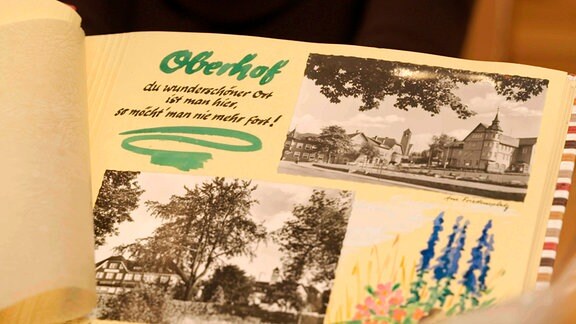 Ein Fotoalbum mit Ansichtskarten und Fots an den Winterurlaub in Oberhof