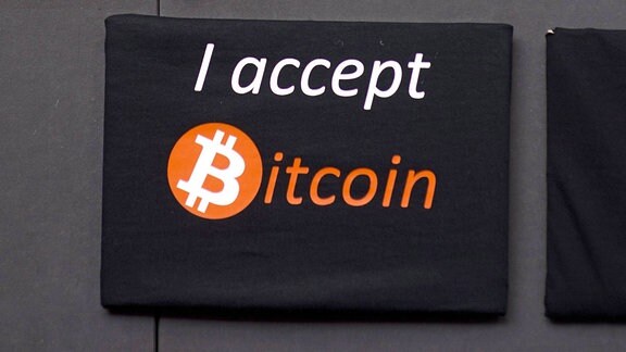 Schild mit der Aufschrift "I accept Bitcoin"