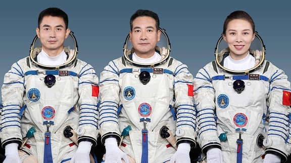 Raumfahrt-Crew der Shenzhou-13 Mission: Ye Guangfu, Zhai Zhigang und Wang Yaping