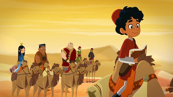 Shila, Luigi und Marco in der Wüste auf Kamelen