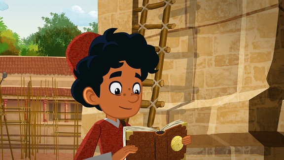 Marco liest in einem Buch