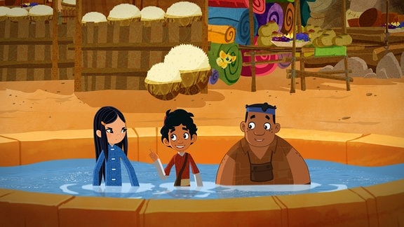 Luigi, Marco und Shila sitzen in einem Brunnen