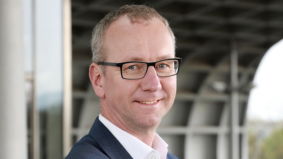 Ein Portrait von Arjan Sissing, dem Markenchef bei Deutsche Post / DHL.