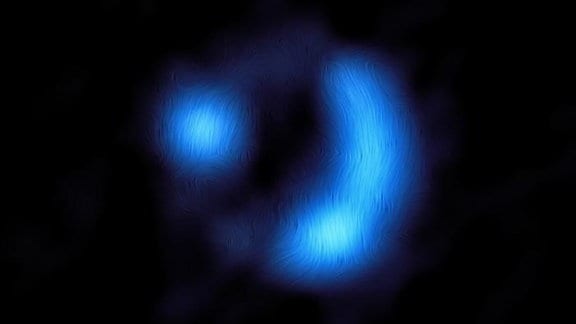 Die Abbildung zeigt das Magnetfeld in der weit entfernten Galaxie 9io9.