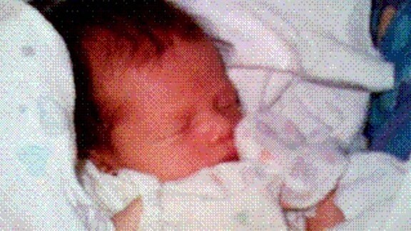 Erstes Handyfoto der Welt - Ein neugeborenes Baby.